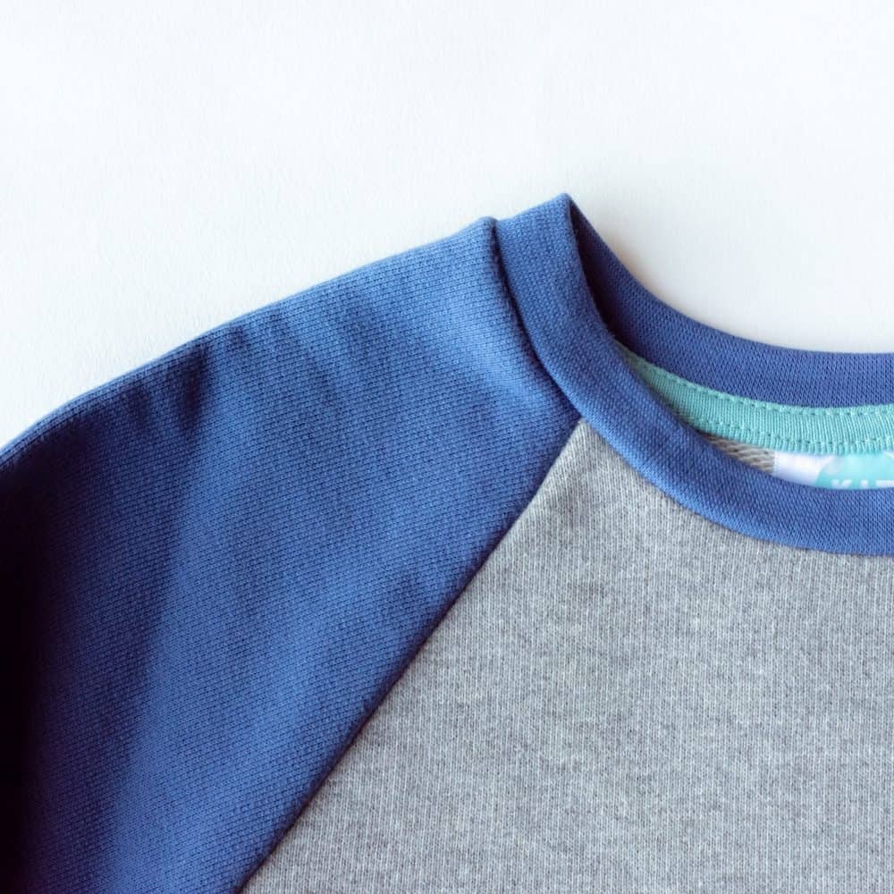 Kit Clothing Organic Cotton Sweatshirt Neckline Close Up Blue
