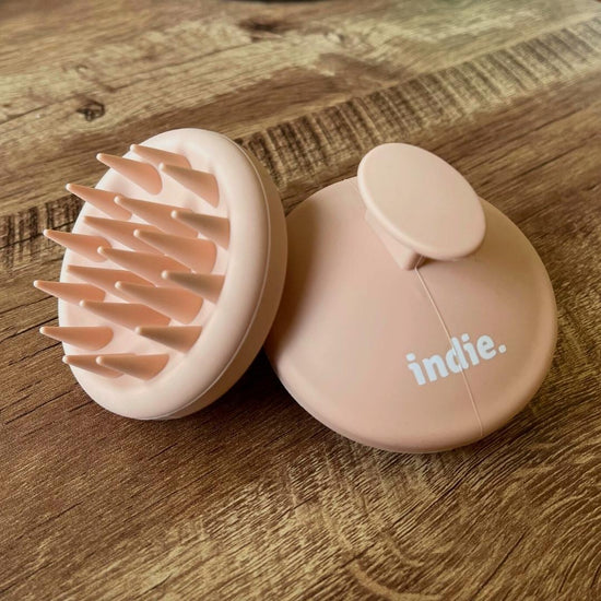 Back Of Pink Scalp Massager With Indie Logo